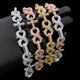 CARATIX Infinity Cross Linked Iced Out Bracelet shown in a color-option context