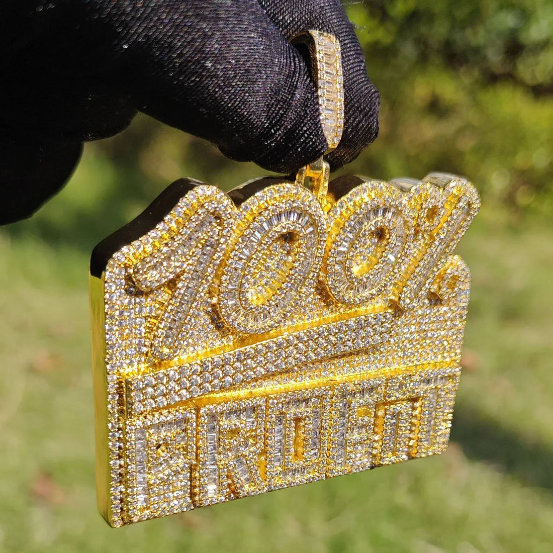 Keep it 100: Why the Iced Out 100% Pendant is the Ultimate Symbol of Authenticity