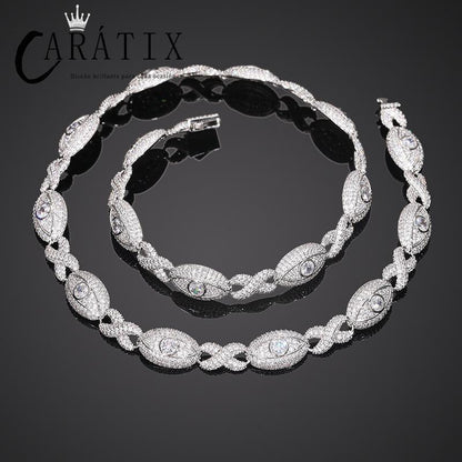 CARÁTIX 5A+ CZ Iced Out Eyes Cuban Link Chain Necklace – Infinity Hip Hop Bling Jewelry for Men & Women | Unisex Rapper Gift - CaratixJewelry